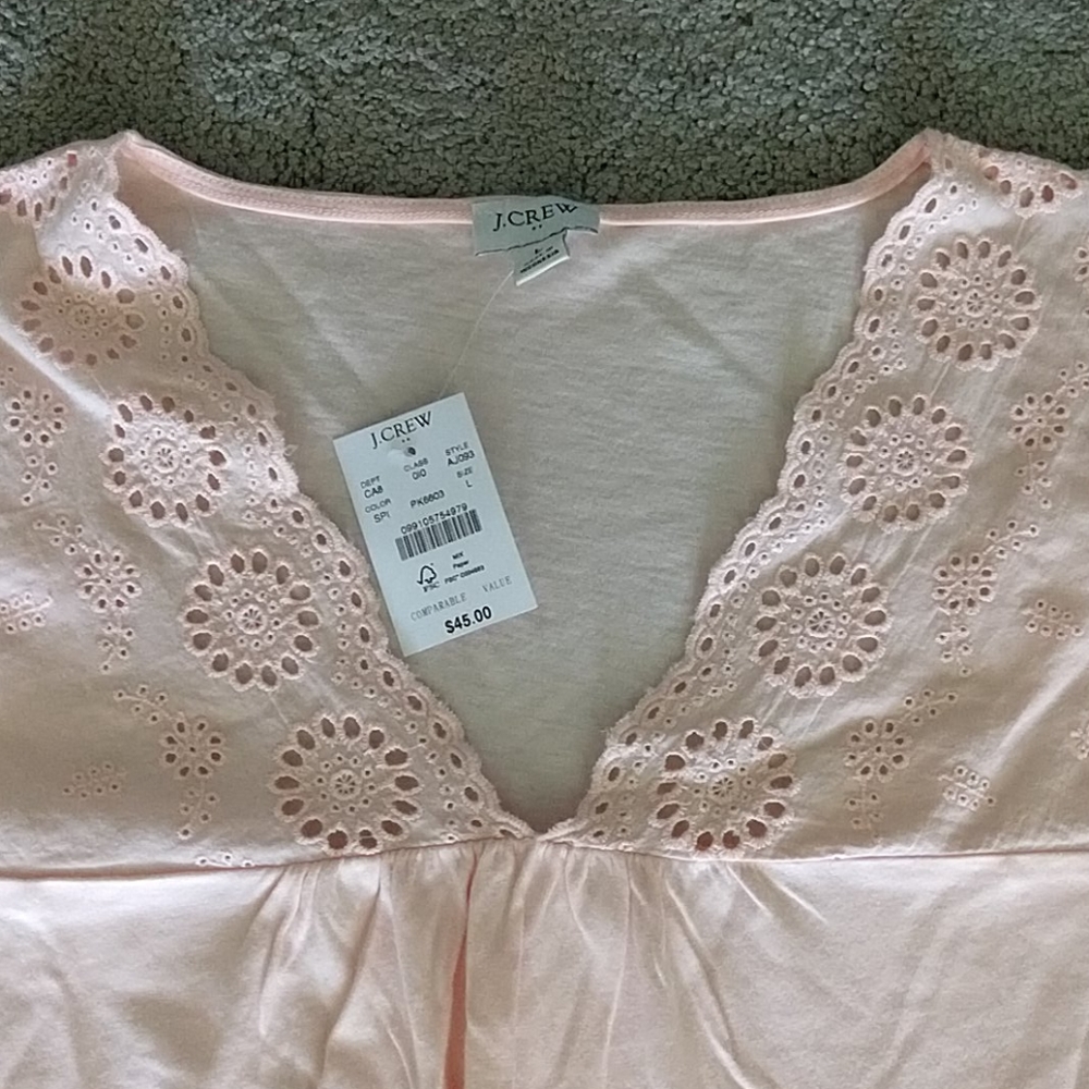JCrew light pink tee with neck and sleeve detail